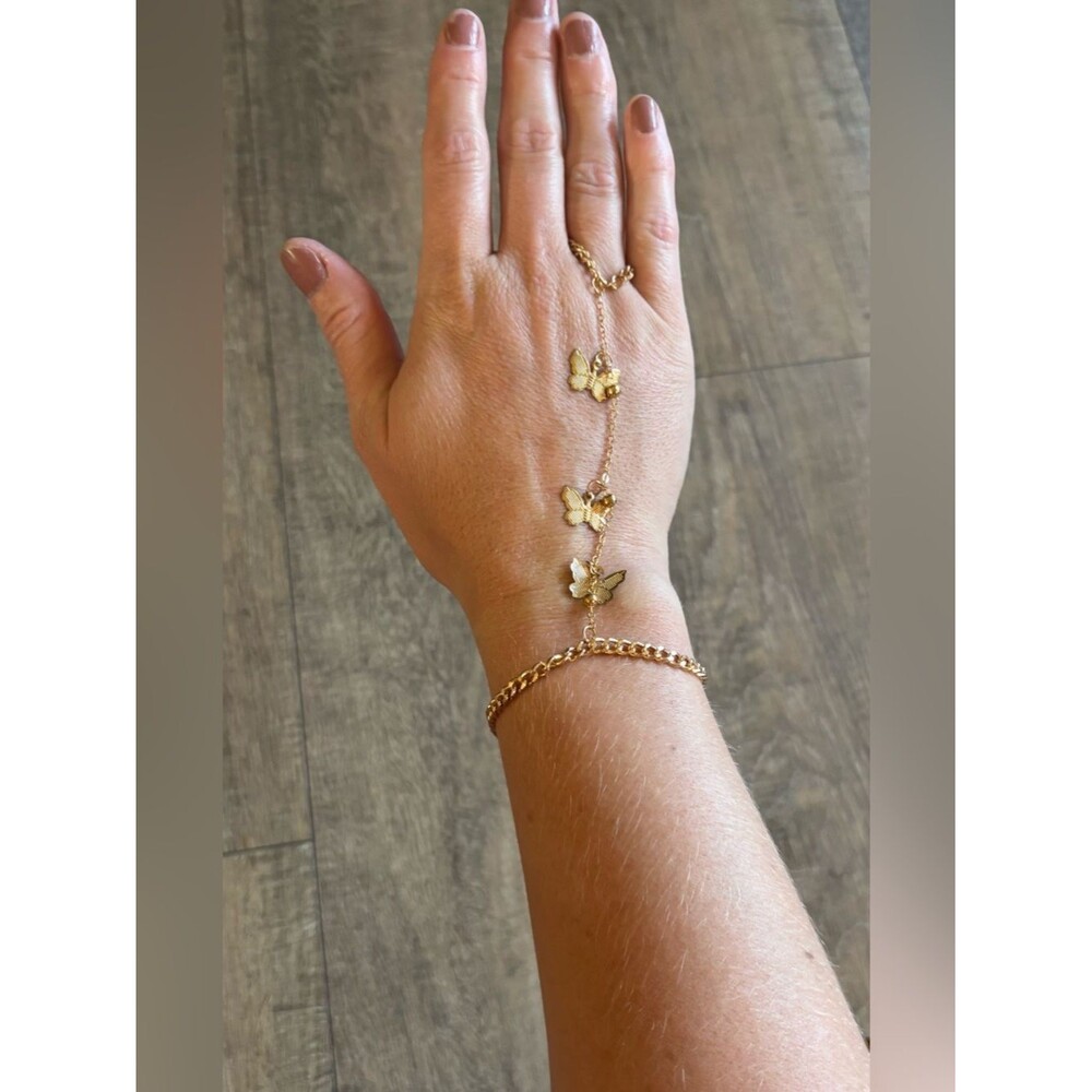 Women’s gold tone butterfly hand chain bracelet